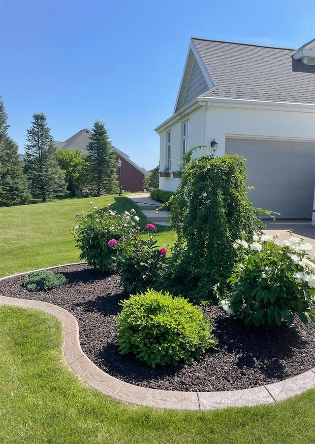 view of yard featuring a garage