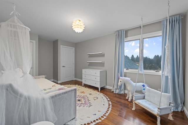 bedroom featuring dark wood-type flooring