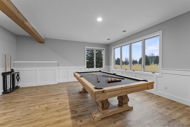 rec room featuring beam ceiling, light hardwood / wood-style flooring, and billiards