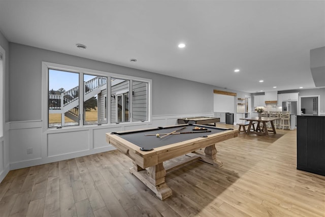 recreation room with light wood-type flooring and billiards