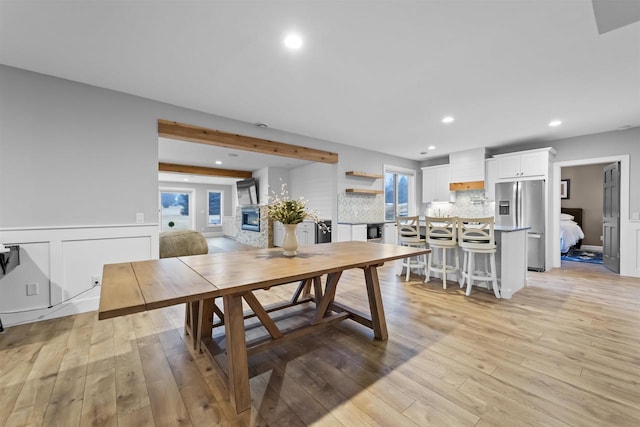 dining room with light hardwood / wood-style flooring