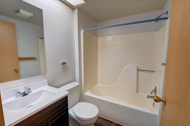 full bathroom with vanity,  shower combination, and toilet