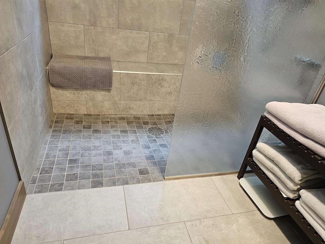 bathroom featuring tile patterned floors and walk in shower