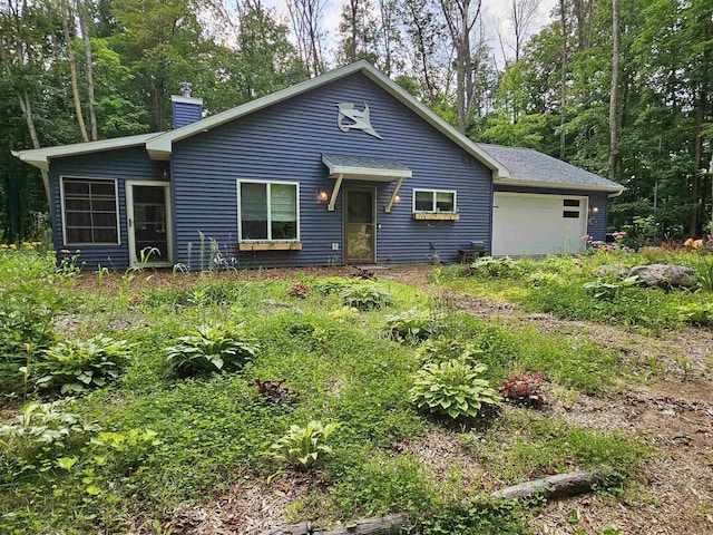 ranch-style home with a garage