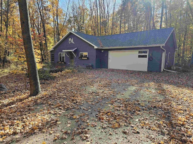 exterior space with a garage