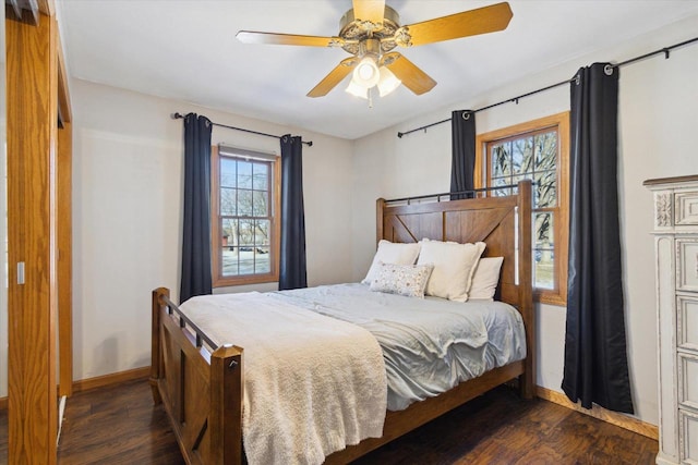 bedroom featuring ceiling fan and dark hardwood / wood-style flooring