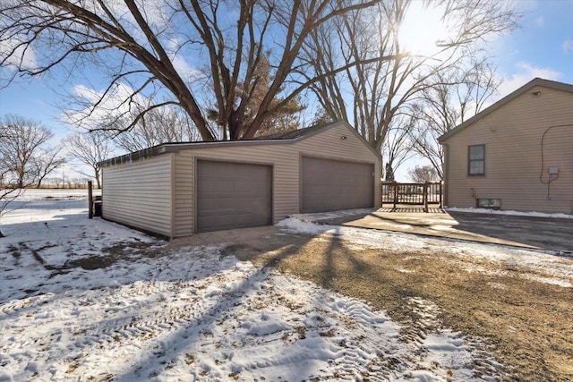 view of snow covered garage