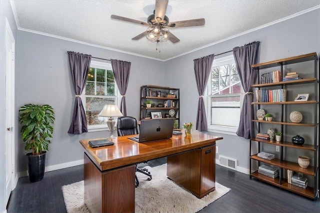 office space featuring crown molding, a healthy amount of sunlight, and dark hardwood / wood-style flooring