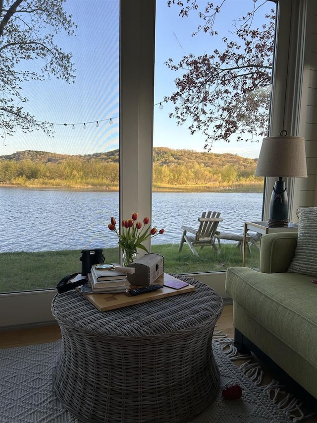 view of patio with a water view