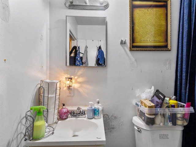 bathroom featuring sink and toilet