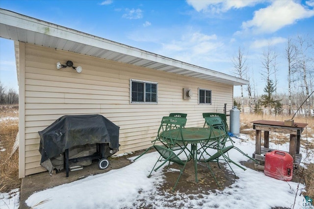 exterior space featuring a grill