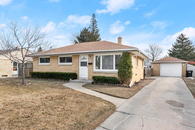 ranch-style home with a garage, an outdoor structure, and a front lawn