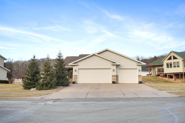 view of front of house with a garage and a front yard