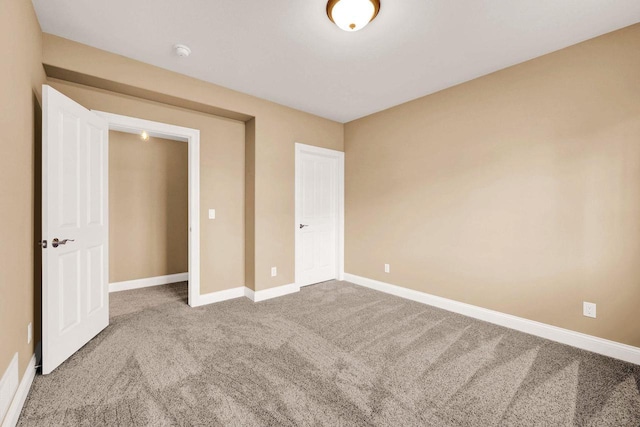 unfurnished bedroom featuring carpet floors