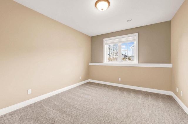 empty room featuring carpet flooring