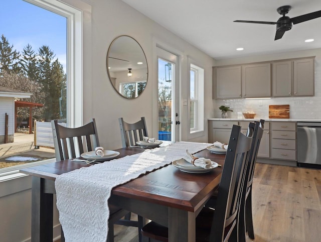 dining room featuring hardwood / wood-style flooring and ceiling fan