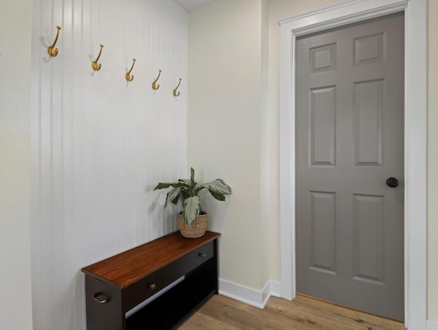 mudroom with light hardwood / wood-style floors