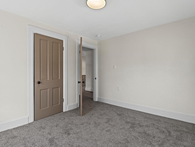 unfurnished bedroom featuring carpet