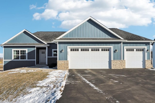 craftsman inspired home featuring a garage