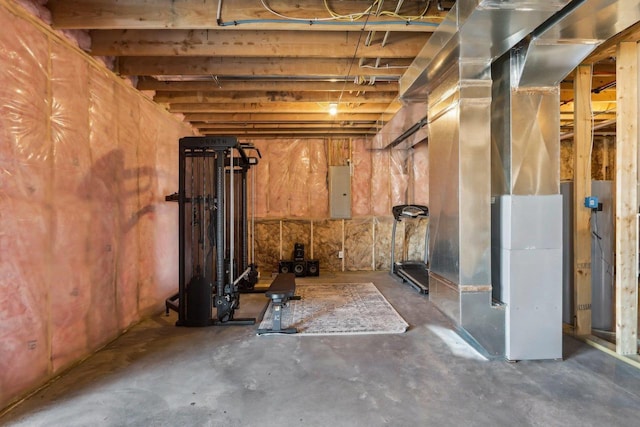 basement featuring electric panel