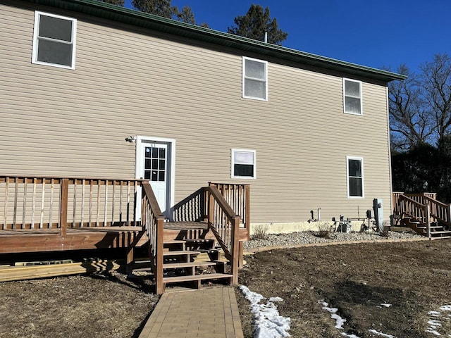 rear view of house with a deck