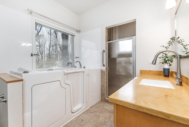 bathroom featuring vanity