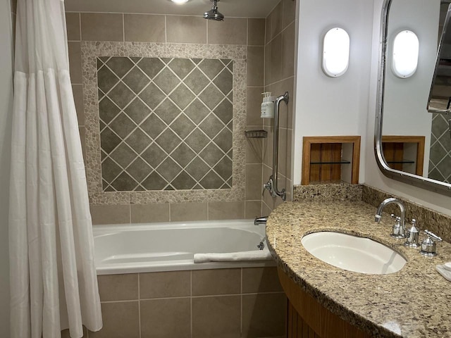 bathroom featuring shower / tub combo with curtain and vanity