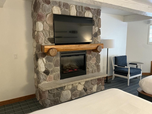 bedroom featuring a fireplace