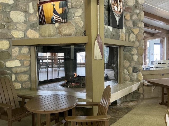 dining room with beam ceiling