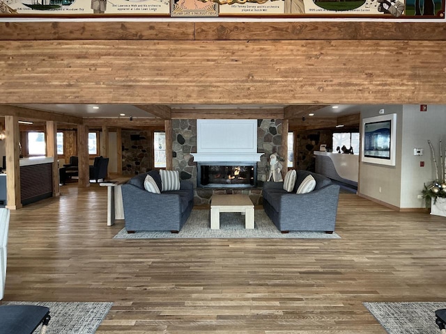 unfurnished living room with hardwood / wood-style floors