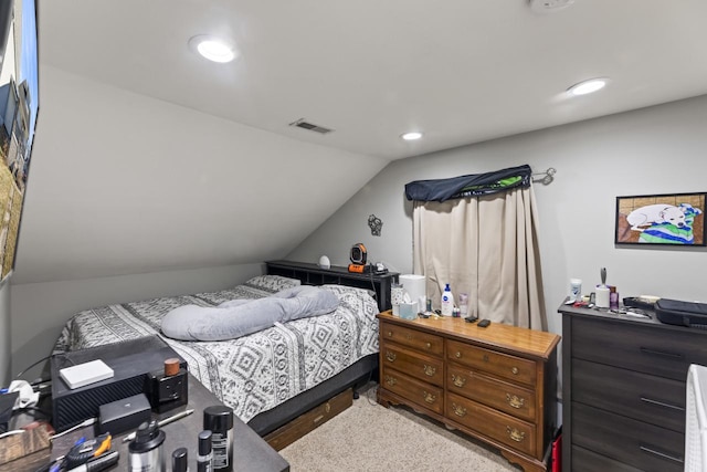 bedroom with lofted ceiling