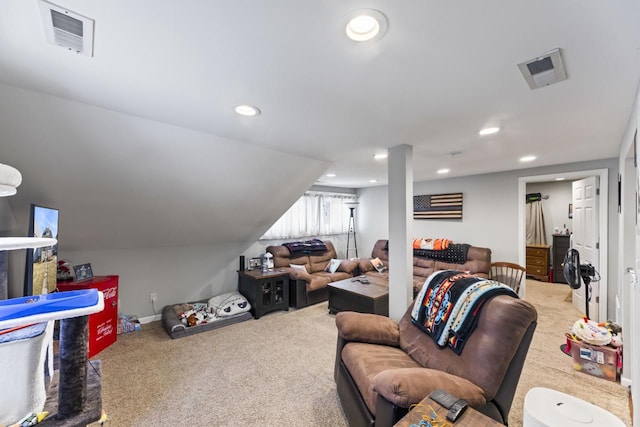 living room with lofted ceiling and carpet floors