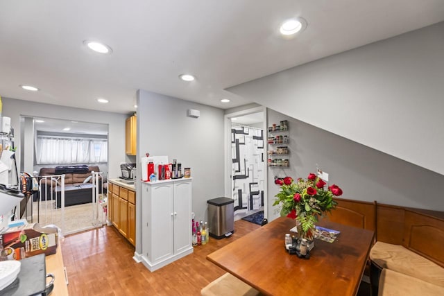 dining space featuring light wood-type flooring