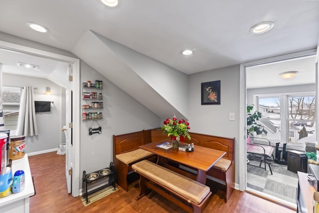 dining area with wood-type flooring