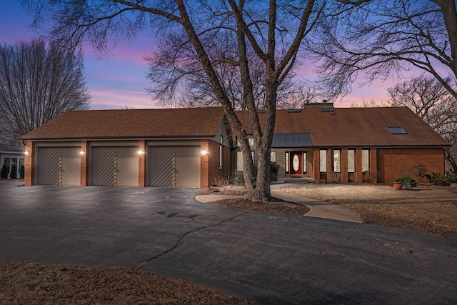 view of front of property featuring a garage