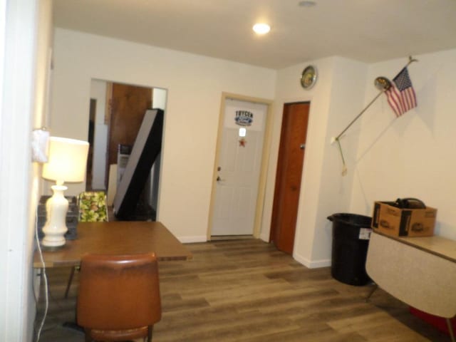 foyer entrance with dark hardwood / wood-style flooring