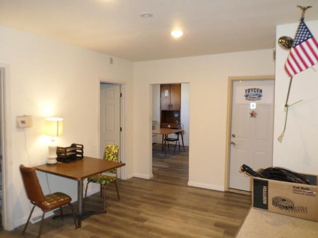 entrance foyer with dark hardwood / wood-style floors