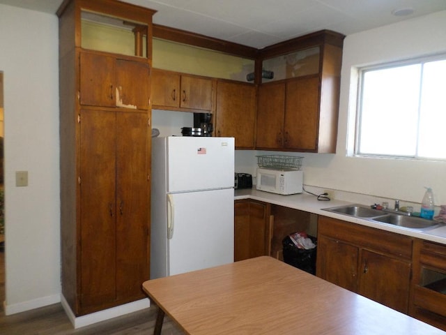 kitchen with sink and white appliances