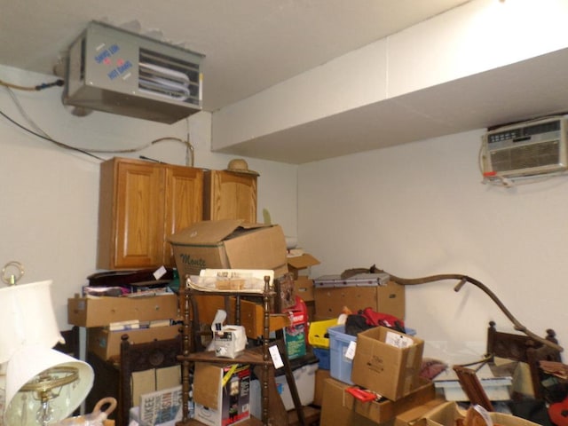 interior space with a wall mounted air conditioner