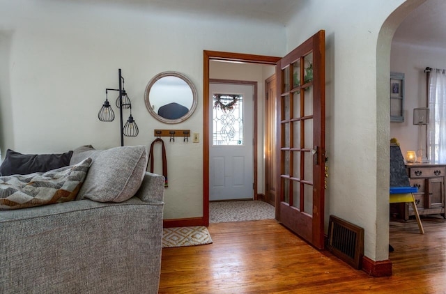 foyer featuring dark hardwood / wood-style floors