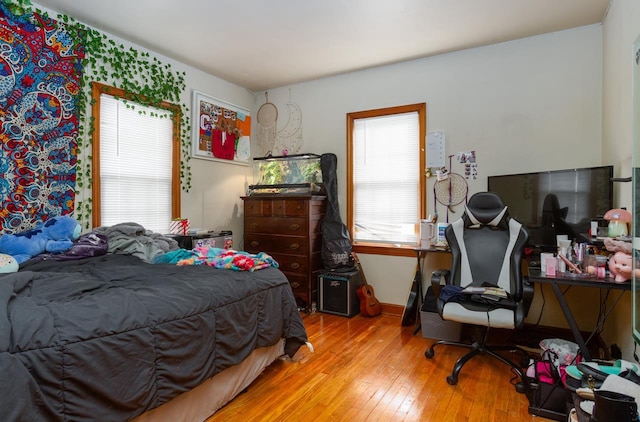 bedroom with light wood-type flooring