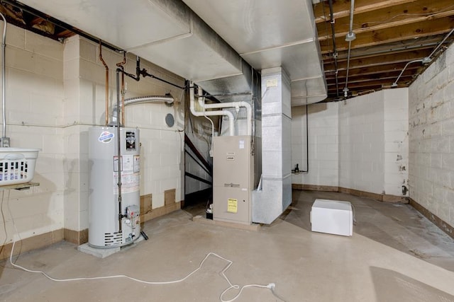 basement with heating unit and water heater