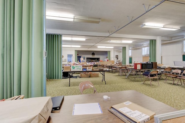 view of carpeted dining area