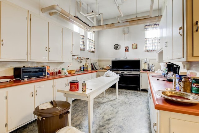 kitchen with sink and white cabinets