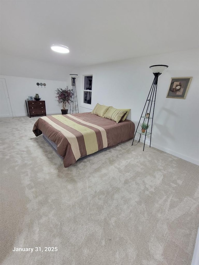 bedroom with light carpet