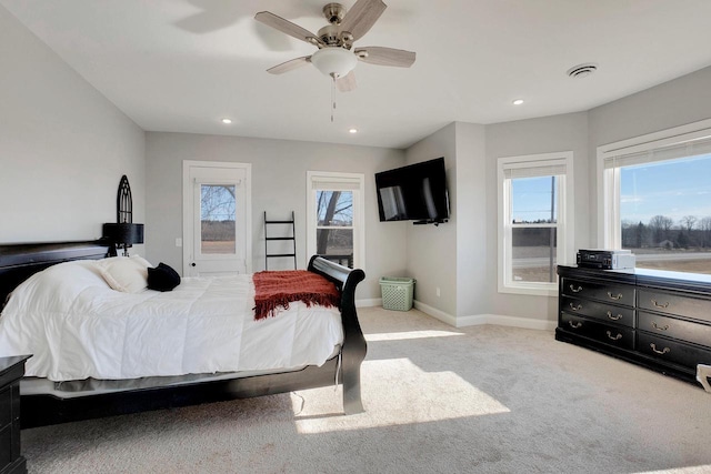 carpeted bedroom featuring ceiling fan