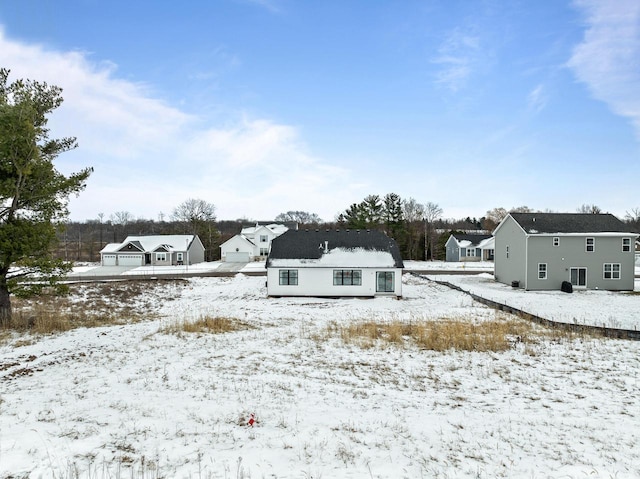 view of yard covered in snow