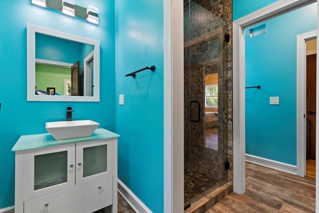 4922 W Dean Rd, Milwaukee, WI 53223 - bathroom with a shower stall, baseboards, and wood finished floors
