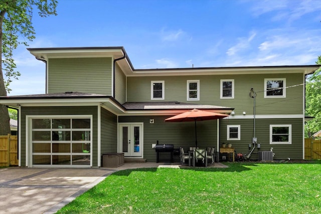 4922 W Dean Rd, Milwaukee, WI 53223 - back of house featuring central air condition unit, french doors, and a patio area