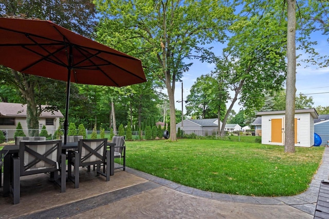 4922 W Dean Rd, Milwaukee, WI 53223 - view of yard featuring a patio, an outbuilding, a storage shed, and outdoor dining area